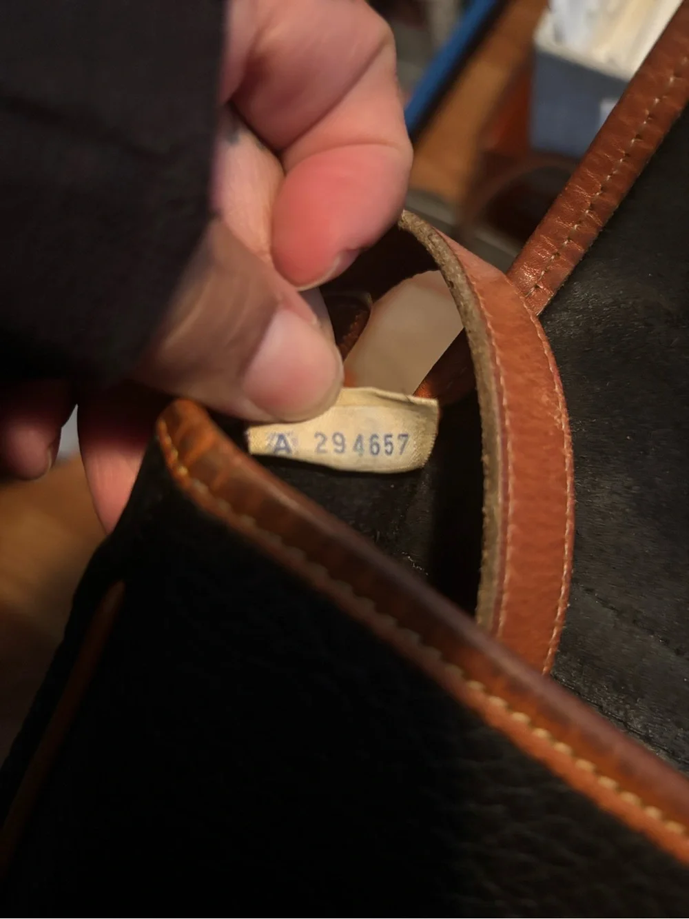 Dooney & Bourke Black Pebbled Leather Clutch with Brown Trim
